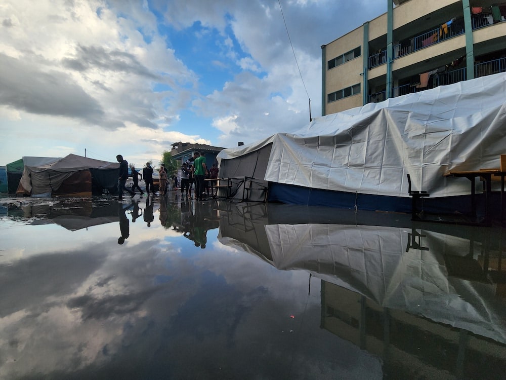 Palestinians taking shelter in a UNRWA school struggle with downpours, strong winds and flooding.