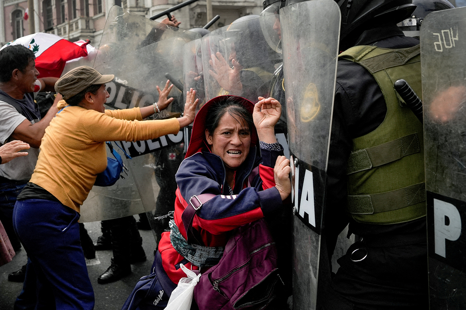 Anti-government demonstrators clash with police during a national protest to demand the resignation of Peruvian President Dina Boluarte, in Lima, Peru, July 29, 2023. REUTERS/Angela Ponce